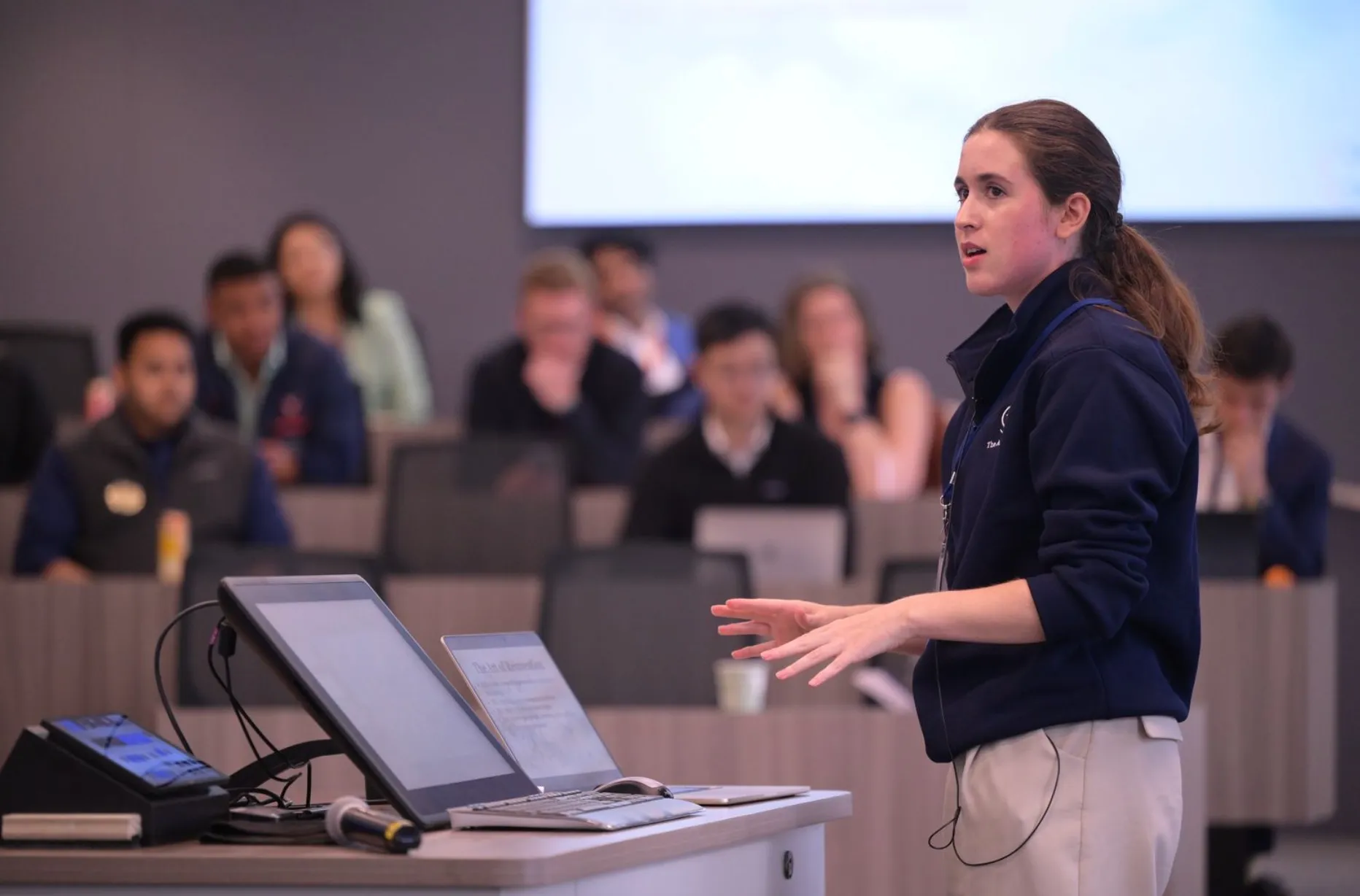 Catherine presenting to an audience