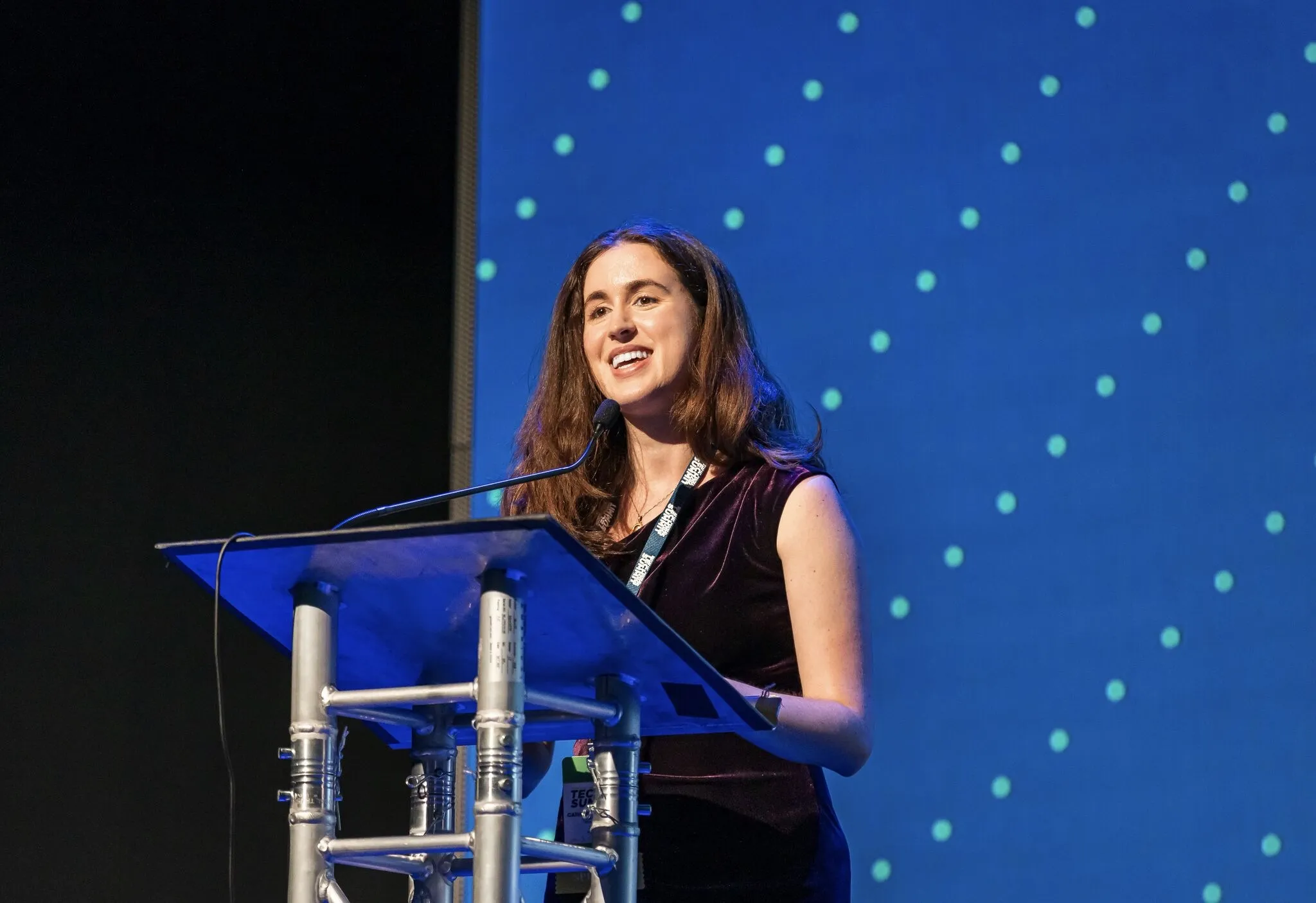 Catherine speaking at a conference